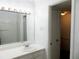 Functional bathroom with a combination shower and tub, sink and vanity at 5586 Kingsport Dr, Atlanta, GA 30342