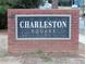 Charleston Square community sign on a brick base near a street at 5586 Kingsport Dr, Atlanta, GA 30342