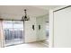Bright dining room with sliding glass doors to the outside and mirrored wall at 5586 Kingsport Dr, Atlanta, GA 30342