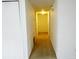 Hallway with neutral carpeting, white walls, and access to various rooms at 5586 Kingsport Dr, Atlanta, GA 30342