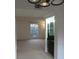 Bright living room showcasing neutral walls and carpet, with a dining area visible at 5586 Kingsport Dr, Atlanta, GA 30342