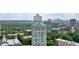 Scenic aerial view showcasing lush green trees and the Atlanta Skyline at 2870 Pharr Court South Nw # 2901, Atlanta, GA 30305