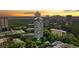 Stunning aerial view of residential tower surrounded by lush greenery and city skyline in the background at 2870 Pharr Court South Nw # 2901, Atlanta, GA 30305