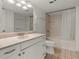 Bathroom featuring white vanity, toilet and shower with a curtain rod at 2870 Pharr Court South Nw # 2901, Atlanta, GA 30305