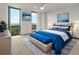 Well-lit bedroom featuring a large window, modern decor, and a comfortable bed with stylish bedding at 2870 Pharr Court South Nw # 2901, Atlanta, GA 30305