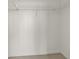 Walk-in closet with white shelves and beige carpet flooring at 2870 Pharr Court South Nw # 2901, Atlanta, GA 30305