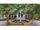 Exterior view featuring a tranquil fountain and beautiful trees at 2870 Pharr Court South Nw # 2901, Atlanta, GA 30305