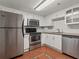 Modern kitchen featuring stainless steel appliances and white cabinets at 2870 Pharr Court South Nw # 2901, Atlanta, GA 30305