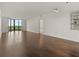 Open living area with hardwood flooring, large windows, and neutral paint at 2870 Pharr Court South Nw # 2901, Atlanta, GA 30305