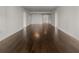 Open-concept living area with dark hardwood flooring and neutral walls at 2870 Pharr Court South Nw # 2901, Atlanta, GA 30305