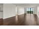 Bright living room with dark hardwood floors, and a large window with scenic views at 2870 Pharr Court South Nw # 2901, Atlanta, GA 30305