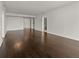 Bright living room showcasing hardwood floors, neutral walls, and a spacious layout at 2870 Pharr Court South Nw # 2901, Atlanta, GA 30305
