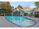 Outdoor community pool area with inviting blue water, lounge chairs, and well-maintained landscaping at 2870 Pharr Court South Nw # 2901, Atlanta, GA 30305