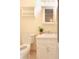 Cozy bathroom with white cabinetry, toilet, and a mirror at 3969 Briaridge Cir, Atlanta, GA 30340