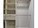 Well-designed closet featuring a combination of shelves, drawers, and hanging rods for optimal organization at 346 Carpenter Dr # 29, Atlanta, GA 30328