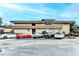 A multi-level apartment complex with brick facade, well-manicured bushes and convenient parking at 346 Carpenter Dr # 29, Atlanta, GA 30328