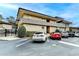 A multi-level apartment building with brick facade and well-maintained landscaping surrounded by ample parking at 346 Carpenter Dr # 29, Atlanta, GA 30328