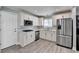 Well-equipped kitchen with stainless steel appliances and crisp white cabinetry at 346 Carpenter Dr # 29, Atlanta, GA 30328