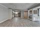 Bright open-concept kitchen featuring white cabinets, stainless steel appliances, and sleek, modern finishes at 346 Carpenter Dr # 29, Atlanta, GA 30328