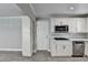 Well-equipped kitchen with stainless steel appliances and crisp white cabinetry at 346 Carpenter Dr # 29, Atlanta, GA 30328