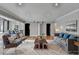 Stylish living room with comfortable seating, modern decor, and large windows at 346 Carpenter Dr # 29, Atlanta, GA 30328