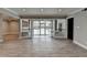 Open-concept living area with access to an outdoor pool area and a swing at 346 Carpenter Dr # 29, Atlanta, GA 30328