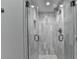 Updated shower features glass doors and decorative marble tile at 346 Carpenter Dr # 29, Atlanta, GA 30328