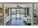 Inviting sunroom with a hanging daybed and a view of the community pool, perfect for relaxation and entertainment at 346 Carpenter Dr # 29, Atlanta, GA 30328