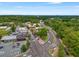 Aerial view of downtown area, including the roads, buildings, and lush greenery at 355 Highlands Trce, Roswell, GA 30075