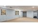 Spacious basement featuring a walkout door and window offering natural light at 355 Highlands Trce, Roswell, GA 30075