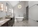 Luxury bathroom with a soaking tub, walk-in shower, and double vanity at 355 Highlands Trce, Roswell, GA 30075