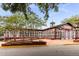 Stunning Roswell Mill building featuring lots of windows, a beautiful roof, and manicured landscaping at 355 Highlands Trce, Roswell, GA 30075
