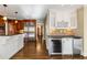 Kitchen featuring modern appliances, custom cabinets, granite counters, and a wine fridge at 355 Highlands Trce, Roswell, GA 30075