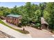 View of a historic brick building with covered bridge entrance at 355 Highlands Trce, Roswell, GA 30075