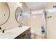Bathroom featuring double sinks with marble countertops and a shower-tub combo at 384 Minix Rd, Sharpsburg, GA 30277