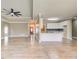 Open-concept living room featuring a partial view of the kitchen with an eat-in bar at 384 Minix Rd, Sharpsburg, GA 30277