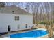 An overhead view shows this large in-ground pool with the house in the background at 384 Minix Rd, Sharpsburg, GA 30277