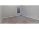 Bedroom featuring neutral walls, carpet, and a window for ample natural light at 4719 Joseph Eli Dr, Snellville, GA 30039