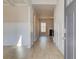 Bright foyer featuring hardwood floors, stylish wainscoting, and a welcoming entrance at 124 Felicity Pike, Locust Grove, GA 30248