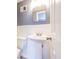 Bathroom featuring a pedestal sink, gray walls and modern fixtures at 1343 Renee Dr, Decatur, GA 30035
