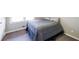 Well-lit bedroom with plush carpeting and neutral paint at 1343 Renee Dr, Decatur, GA 30035