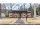 Charming brick home with a welcoming front porch and inviting curb appeal at 1343 Renee Dr, Decatur, GA 30035
