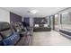 Bright living room with electric recliners, and a large sliding glass doors at 1343 Renee Dr, Decatur, GA 30035