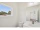 Bright bathroom with white vanity, and a large mirror at 1092 Glen Opal Dr, Decatur, GA 30032