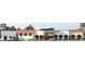 Modern commercial building with a combination of brick and white facade, complemented by black awnings and a well-maintained landscape at 1092 Glen Opal Dr, Decatur, GA 30032