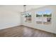 Dining room features modern lighting and large windows at 1092 Glen Opal Dr, Decatur, GA 30032