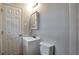Modern bathroom with bright vanity, overhead lighting and a clean, efficient design at 1098 Laurel Nw Ln, Conyers, GA 30012