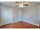 Hardwood floors, double closets and natural light make this a comfortable bedroom at 1098 Laurel Nw Ln, Conyers, GA 30012