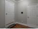 Hallway with wood-look floors and neutral paint at 1098 Laurel Nw Ln, Conyers, GA 30012