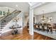 Elegant dining room featuring a chandelier, large window, and traditional furnishings, perfect for formal gatherings at 2310 Gracehaven Way, Lawrenceville, GA 30043